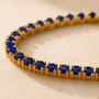DHARIN Blue Sapphire Tennis Bracelet - macro detail, round lab-grown sapphires, four-claw setting