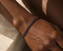 DHARIN Blue Sapphire Tennis Bracelet - editorial detail, lab-grown sapphire continuous band