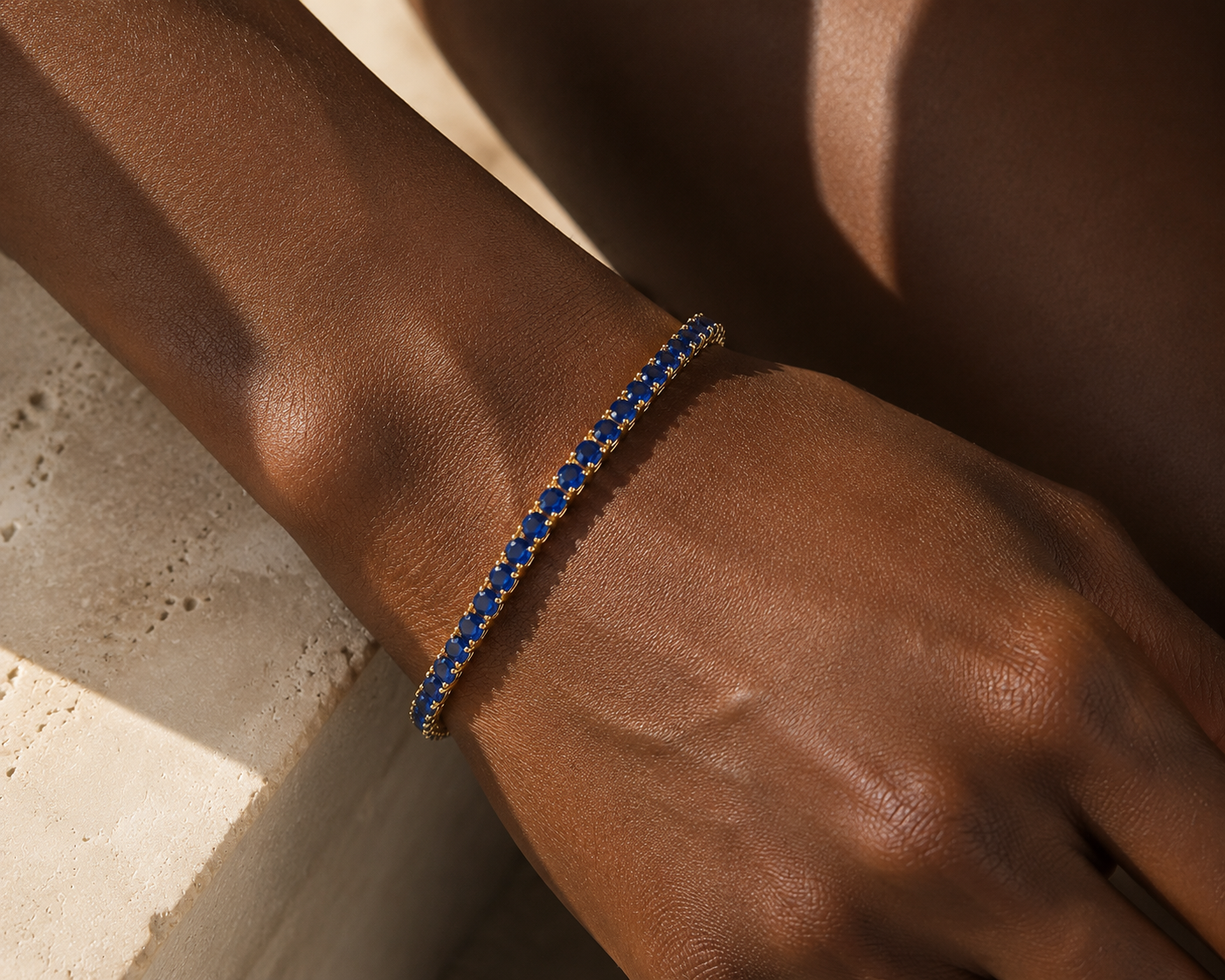 DHARIN Blue Sapphire Tennis Bracelet - editorial detail, lab-grown sapphire continuous band