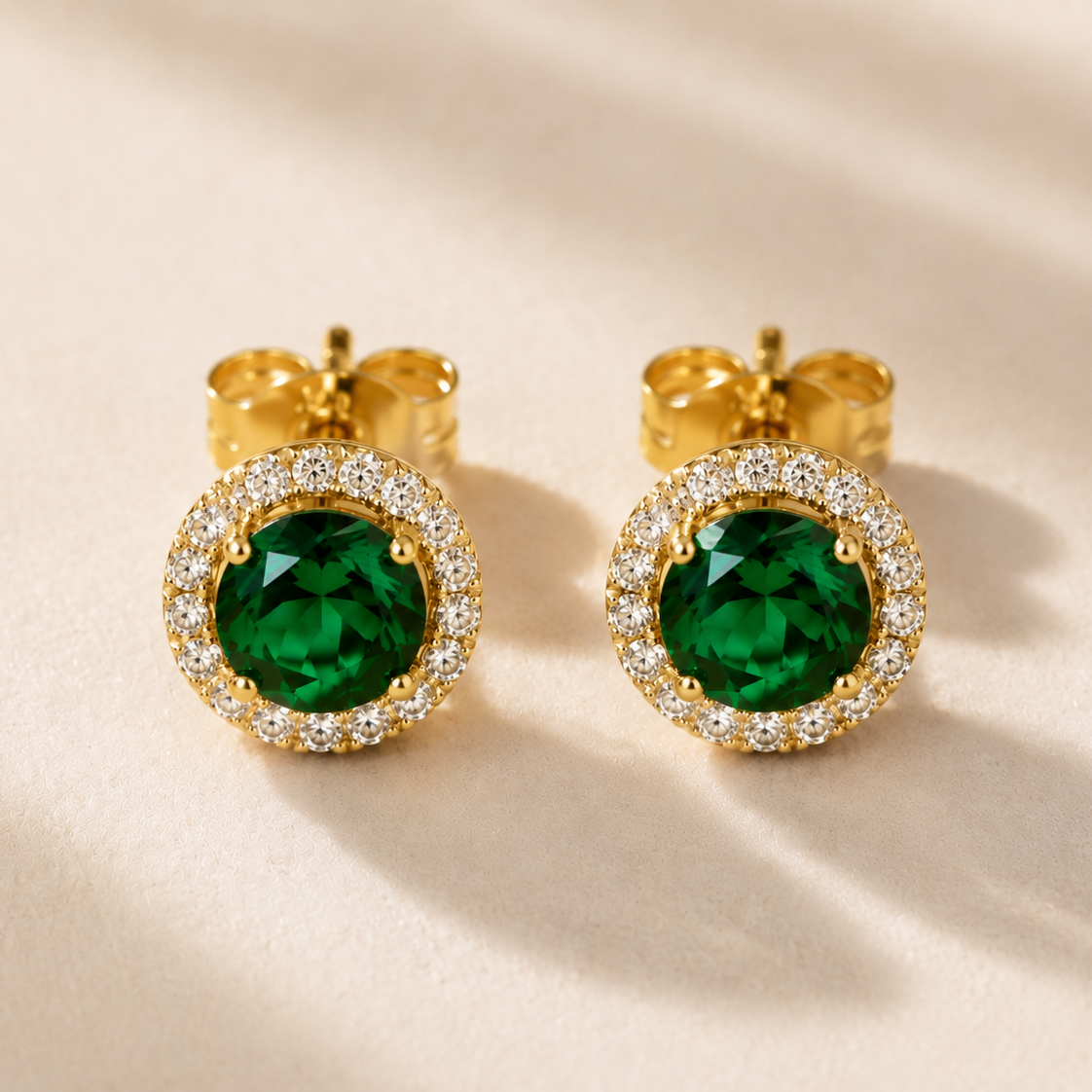 DHARIN Emerald Halo Stud Earrings - macro detail, diamond pavé halo surrounding emerald center stone