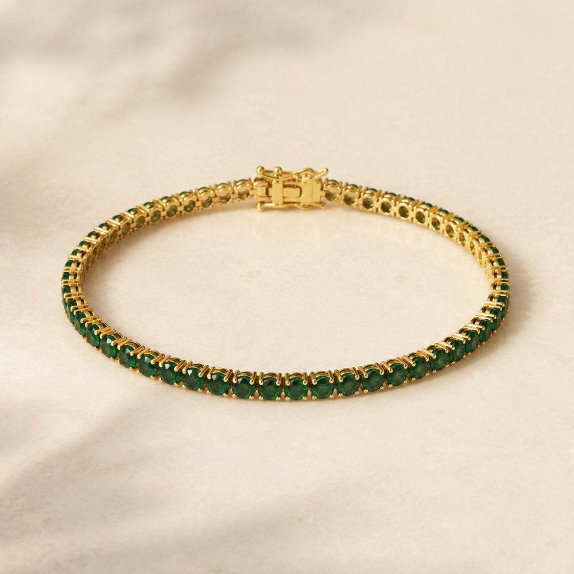 DHARIN Emerald Tennis Bracelet - 18K gold vermeil, vivid green emerald row, warm gold tone