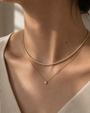 DHARIN Delicate Diamond Tennis Necklace - 14K white gold 2ct, 40 diamonds 2.5mm, flat lay overhead