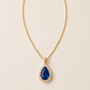 DHARIN Teardrop Gemstone Pendant - emerald 18K gold vermeil, flat lay overhead view