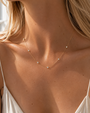 DHARIN Station Diamond Layering Necklace - neck wearing view, collarbone, asymmetric diamond placement