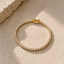 DHARIN Classic Lab Diamond Tennis Bracelet - 3ct, limestone surface, 18K gold vermeil, quality detail