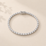 DHARIN Classic Lab Diamond Tennis Bracelet - 1.5ct, 14K white gold cool bright finish, approximately 24 diamonds 2.5mm, flat lay overhead