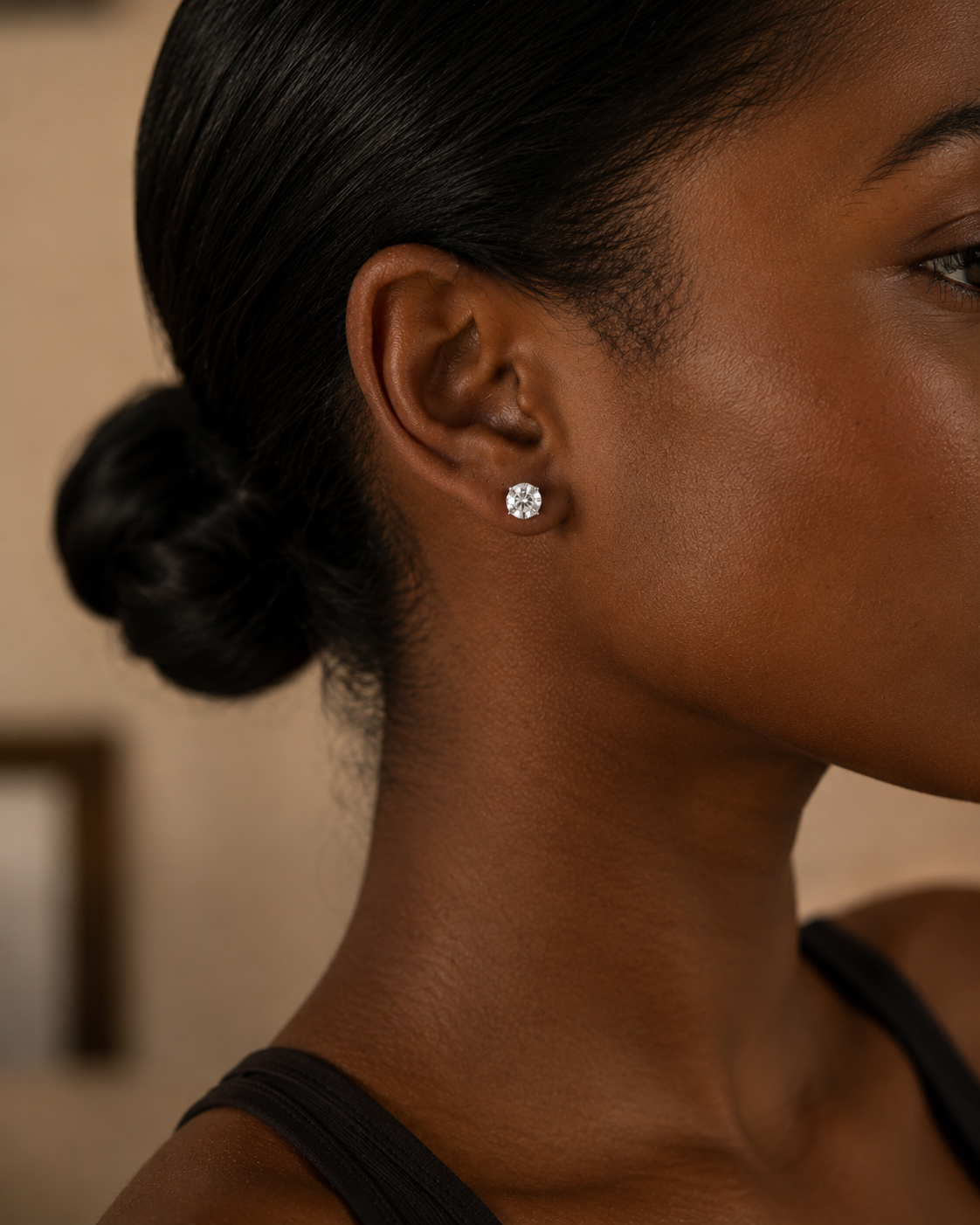 DHARIN Solitaire Lab Diamond Stud Earrings - close-up ear view, round brilliant diamond stud, quiet luxury