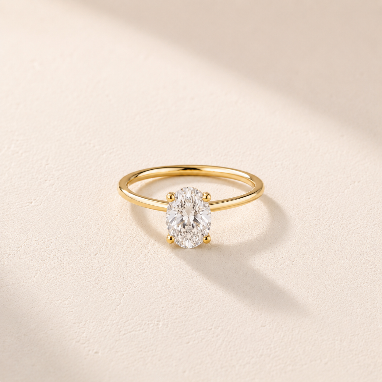 DHARIN Oval Solitaire Ring Slim Band - 14K gold, overhead flat view, lab-grown diamond