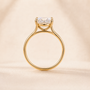 DHARIN Oval Solitaire Ring - hand wearing view, slim band engagement ring lifestyle