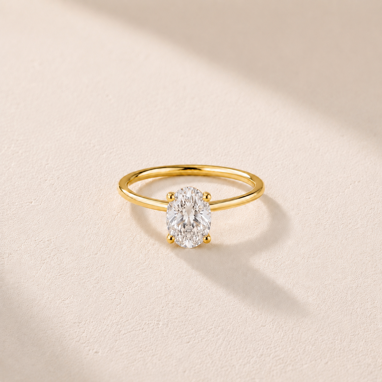 DHARIN Oval Solitaire Ring - 14K yellow gold, warm gold tone, oval diamond solitaire