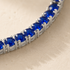 DHARIN Blue Sapphire Tennis Bracelet - wrist wearing lifestyle, deep blue sapphire, quiet luxury